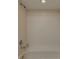 Clean and well-maintained shower and tub area with white tile at 2567 Bentley Dr, Palm Harbor, FL 34684