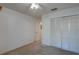 Neutral bedroom with closet and door leading to the rest of the home at 2567 Bentley Dr, Palm Harbor, FL 34684