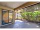 Screened-in patio with stained glass and great light at 2567 Bentley Dr, Palm Harbor, FL 34684
