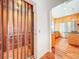 Modern home elevator conveniently located by the kitchen with hardwood floors for seamless accessibility at 2902 N Shoreview Pl, Tampa, FL 33602