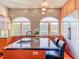 Modern kitchen with stainless steel appliances, a kitchen island, and hardwood flooring at 2902 N Shoreview Pl, Tampa, FL 33602