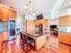 Stylish kitchen featuring custom cabinetry, granite countertops, high-end appliances, and an island with seating at 2902 N Shoreview Pl, Tampa, FL 33602