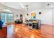 Bright living room features hardwood floors, an open layout, and access to the outdoors at 2902 N Shoreview Pl, Tampa, FL 33602
