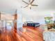 Spacious primary bedroom featuring hardwood floors and a view of the lush outdoors at 2902 N Shoreview Pl, Tampa, FL 33602