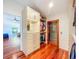 Custom walk-in closet with wood floors and custom storage with granite countertop for accessories at 2902 N Shoreview Pl, Tampa, FL 33602