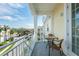 Outdoor balcony with seating and neighborhood views at 7611 34Th W Ave # 303, Bradenton, FL 34209