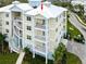 Beautiful exterior view of condo with multiple balconies and staircase at 7611 34Th W Ave # 303, Bradenton, FL 34209