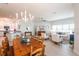 Open-concept living room with dining area and kitchen at 7611 34Th W Ave # 303, Bradenton, FL 34209
