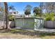Backyard shed structure with dual entry points, providing ample storage at 3087 Duane Ave, Oldsmar, FL 34677