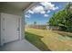 A spacious backyard with a new fence and lush grass is perfect for outdoor activities at 3801 Luma Dr, Holiday, FL 34691