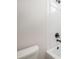 Bright bathroom featuring a bathtub-shower combination with black shower fixtures at 3801 Luma Dr, Holiday, FL 34691