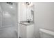 Bathroom with granite countertop vanity, with views into an adjacent carpeted room at 3801 Luma Dr, Holiday, FL 34691