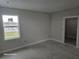 Bedroom with neutral colors, natural light, and freshly painted walls at 3801 Luma Dr, Holiday, FL 34691