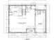 Layout showcasing the kitchen, living area with 9'4