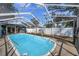 Pool in screened enclosure, offers a private outdoor oasis with plenty of sunshine at 4412 W Pearl Ave, Tampa, FL 33611