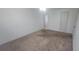 Bedroom featuring neutral paint and carpet, and a view of the doorway at 4725 Michael Ct # 131, Tampa, FL 33614