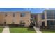 Exterior building view featuring multiple floors and several units at 4725 Michael Ct # 131, Tampa, FL 33614