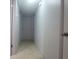 A hallway with access to multiple rooms at 4725 Michael Ct # 131, Tampa, FL 33614