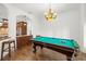 Entertainment space featuring a classic billiards table and custom lighting, perfect for gatherings at 14739 Vista View Ct, Dade City, FL 33523