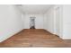 Bedroom with hardwood floors and three doorways at 4614 W Tennyson Ave, Tampa, FL 33629