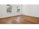 Bedroom with hardwood flooring and natural light at 4614 W Tennyson Ave, Tampa, FL 33629