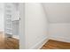 Walk-in closet with custom white shelving at 4614 W Tennyson Ave, Tampa, FL 33629