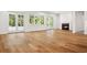Spacious living room with fireplace, natural light and glass doors to the outside at 4614 W Tennyson Ave, Tampa, FL 33629