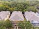 Charming townhome with well-maintained roof, nestled among lush trees offering a serene, private setting at 4734 Chatterton Way, Riverview, FL 33578
