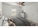 Comfortable bedroom with natural light, a dresser, and a relaxing ambiance at 4734 Chatterton Way, Riverview, FL 33578