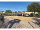 Community splash pad with playful water features, surrounded by well-kept landscaping and community homes at 4734 Chatterton Way, Riverview, FL 33578
