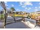 Backyard featuring a deck and dock ideal for boating and enjoying waterfront living at 1881 Riveredge Dr, Tarpon Springs, FL 34689