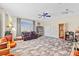 Large bonus room features plenty of space for recreation and relaxation at 1881 Riveredge Dr, Tarpon Springs, FL 34689
