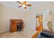 Dedicated home office with a classic wood desk and staircase, perfect for focused work and study at 1881 Riveredge Dr, Tarpon Springs, FL 34689