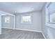 Bright room with sliding closet doors, modern floor, and fresh paint at 245 58Th N St, St Petersburg, FL 33710
