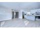 Open floor plan with a view of the kitchen, stainless steel appliances, and modern design at 245 58Th N St, St Petersburg, FL 33710