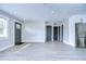 Inviting living room with updated flooring, a neutral palette, and an open layout at 245 58Th N St, St Petersburg, FL 33710