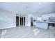 Open concept living space with modern finishes, new floors, and plenty of natural light at 245 58Th N St, St Petersburg, FL 33710