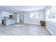 Spacious living room featuring an open floor plan and an eat-in kitchen at 245 58Th N St, St Petersburg, FL 33710