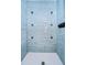 Modern walk-in shower featuring a rainfall showerhead and multiple body sprayers at 245 58Th N St, St Petersburg, FL 33710