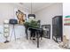 Cozy living room featuring a grand piano and stylish decor at 27045 Firebush Dr, Wesley Chapel, FL 33544