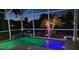 A beautifully lit pool at night, perfect for evening swims and relaxation at 27045 Firebush Dr, Wesley Chapel, FL 33544