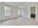 Bedroom featuring two large windows for natural light, and access to the bathroom at 5327 6Th N Ave, St Petersburg, FL 33710