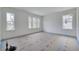 Sunlit bedroom features multiple windows, allowing for ample natural light to fill the space at 5327 6Th N Ave, St Petersburg, FL 33710