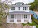 New two-story home with a large front porch and classic white columns at 5327 6Th N Ave, St Petersburg, FL 33710