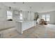 Bright, open kitchen with a large island, pendant lighting, and modern finishes at 5327 6Th N Ave, St Petersburg, FL 33710