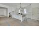 Bright, open kitchen with a large island, pendant lighting, and modern finishes at 5327 6Th N Ave, St Petersburg, FL 33710
