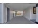 An ample covered carport featuring secure storage options and leading to a private outdoor area at 6326 22Nd N Ave, St Petersburg, FL 33710