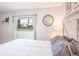 Charming bedroom featuring a view to the outside through the room's large picture window at 7425 118Th Dr, Largo, FL 33773
