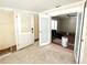 Light and airy entryway featuring a glass door and white trim at 14124 Plum Ln, Hudson, FL 34667