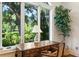 A naturally-lit desk area is the perfect place for working, studying, or enjoying the views from a chair at 3005 S Miller Rd, Valrico, FL 33596